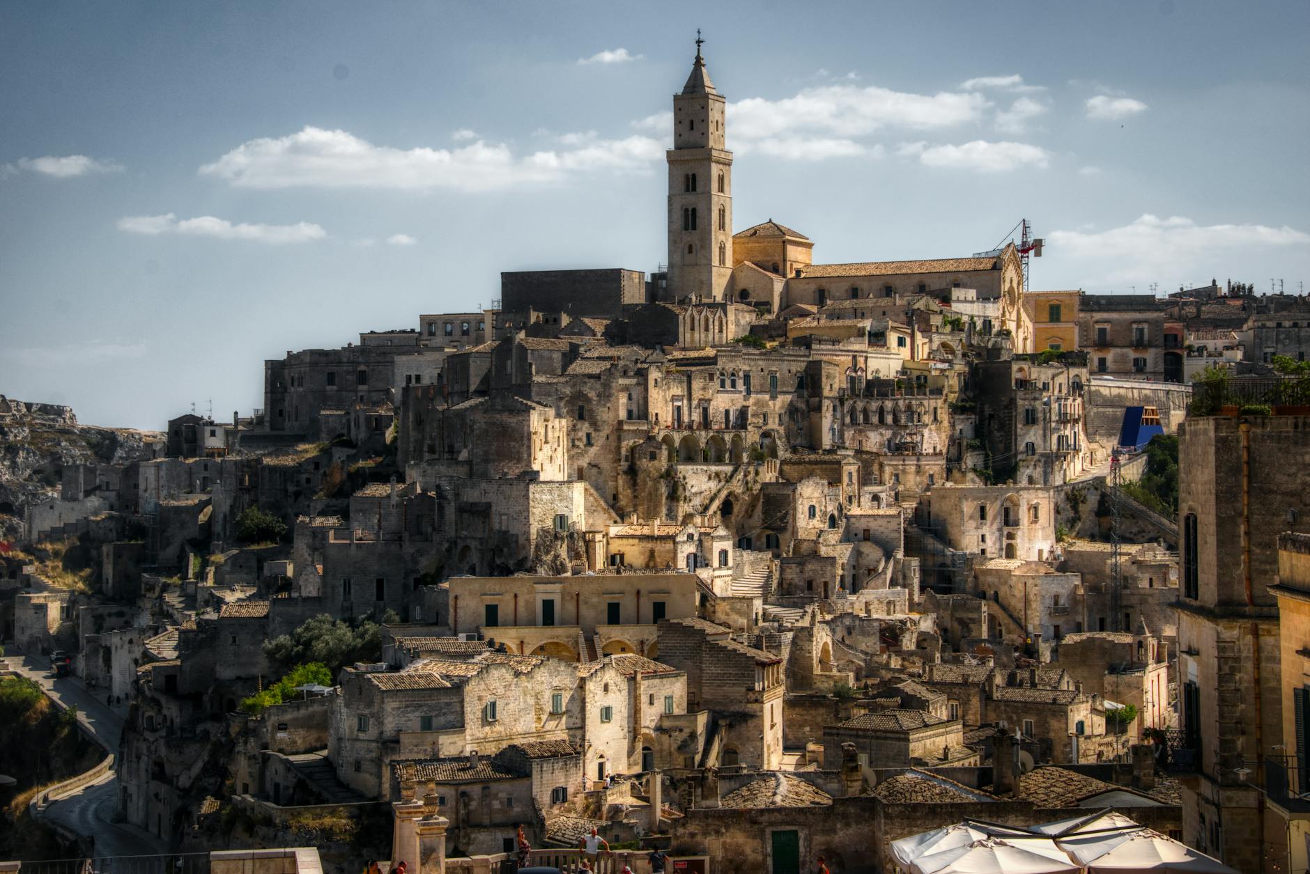 brown concrete buildings under the blue sky